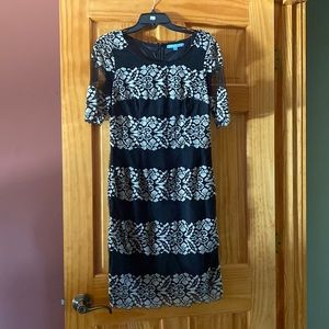 Size 6.  Black and tan dress with elbow sleeves.